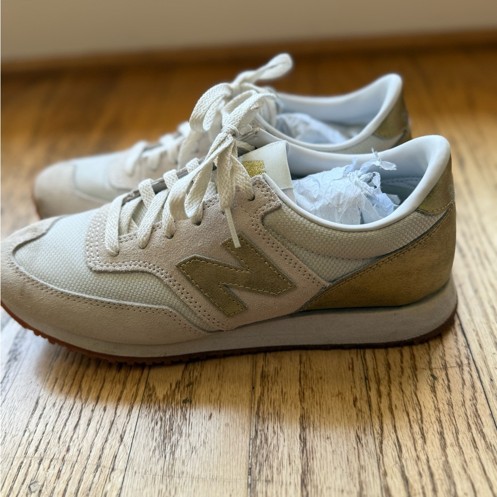 New Balance Beige and Metallic Sneakers